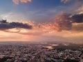 Aerial view on rain clouds at sunset over the city Royalty Free Stock Photo