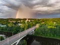 Aerial view of a rainbow over Zirmunai Bridge across Neris River, connecting Zirmunai and Antakalnis districts of Vilnius, Royalty Free Stock Photo