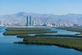 Aerial view of Ras al Khaimah, United Arab Emirates north of Dubai, looking at the city, Hajar mountains - Jebal Jais - and the Royalty Free Stock Photo