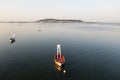 Aerial view of a red boat for the SÃÂ©toises jousts, in the Herault in Occitania, France