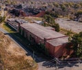 Aerial view of a red brick building situated in a vibrant urban environment in Graham, United States