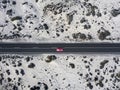 Aerial view of a red car on a road through the desert, sand and dunes, Lanzarote, Canary Islands, Spain Royalty Free Stock Photo