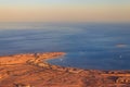 Aerial view on Red sea, Arabian desert and touristic resort near Hurghada, Egypt. View from airplane Royalty Free Stock Photo