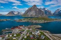 Aerial view of Reine, Lofoten islands, Norway. The fishing village of Reine. Spring time in Nordland. Blue sky. View from above Royalty Free Stock Photo