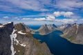 Aerial view of Reine, Lofoten islands, Norway. The fishing village of Reine. Spring time in Nordland. Blue sky. View from above Royalty Free Stock Photo