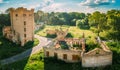 Aerial View Remains Of Yastrzhembsky Estate And Park Complex In Summer Sunset, Sunbeam. Top View Of Old Five-storey