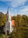 Aerial view of Renda lutheran church in sunny autumn day, Latvia