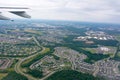 Aerial View of Residence Houses taken from Flying Airplane on Blur Background Royalty Free Stock Photo