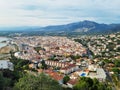 Aerial View of residential buildings, Hotels, Villas in resort town on a sea coast and mountains