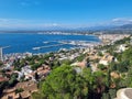 Aerial View of residential buildings, Hotels, Villas in resort town on a sea coast and mountains