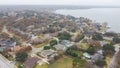 Aerial view residential homes with swimming pool, large backyard, matured trees next to Lake Arlington in Tarrant County, Dallas Royalty Free Stock Photo