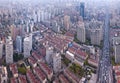 Aerial view of residential houses with skyscraper and high-rise buildings in Shanghai Downtown, China. Financial district and Royalty Free Stock Photo