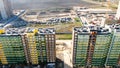 Aerial view of residential houses in suburban area, housing development. Journey. Flying above the new district in the Royalty Free Stock Photo