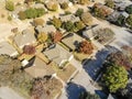 Top view typical Texas residential neighborhood with colorful au