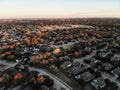 Top view residential subdivision with colorful leaves autumn sun