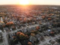 Top view residential subdivision street with colorful leaves autumn sunset in America