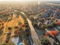 Top view residential area with urban park and colorful fall foliage near Dallas