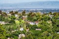 Aerial view of residential neighborhood; San Francisco bay visible in the background; Redwood City, California