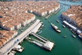 Aerial view of Rialto bridge crossing the Grand Canal in Venice downtown, Veneto, Italy. made with