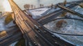 Aerial view of Riga elevated road junction and interchange overpass at winter sunset time Royalty Free Stock Photo