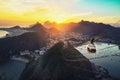 Aerial view of Rio de Janeiro at sunset with Urca and Sugar Loaf Cable Car and Corcovado mountain - Rio de Janeiro, Brazil Royalty Free Stock Photo