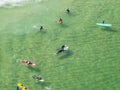Aerial view of Rio de Janeiro, surfers in the water, Ipanema beach. Brazil