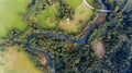 Aerial view of river bend through forest. Royalty Free Stock Photo