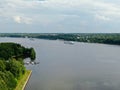 Aerial view river cruise ship sails along the river surrounded by beautiful green forest in summer on a sunny day Cruise Ship Trip Royalty Free Stock Photo