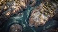 an aerial view of a river flowing between two rocky mountains Royalty Free Stock Photo