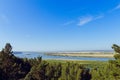 Aerial view the river on green forest plain.. Royalty Free Stock Photo