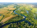 Aerial view of the river, oxbows and backswamps with trees and fields