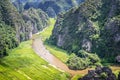 Aerial view of the river among rice fields and limestone mountains, vietnamese scenic landscape at ninh Binh Vietnam Royalty Free Stock Photo