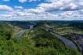 Aerial view of river surrounded by buildings and greenery fields in Moselschleife Royalty Free Stock Photo