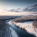 Aerial view of river thorugh snow covered forest in calm scene. Drone view photo from the drone on a cloudy