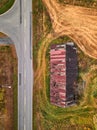Aerial view of the road and abandoned building. Royalty Free Stock Photo