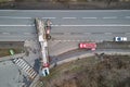 Aerial view of road accident with overturned truck blocking traffic