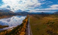 Aerial view of road in beautiful autumn Altai forest Royalty Free Stock Photo