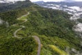 Aerial view of road in beautiful green forest at sunset in spring. Colorful landscape Royalty Free Stock Photo