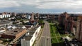 Aerial view of road and buildings near. Big town footage fly drone. Royalty Free Stock Photo