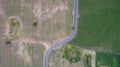 Aerial view road curve construction. Aerial above view of a rural landscape with a curvy road running through. Aerial view of curv