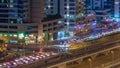 Aerial view of a road intersection in a big city night timelapse. Royalty Free Stock Photo