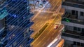 Aerial view of a road intersection in a big city night timelapse. Royalty Free Stock Photo