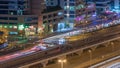 Aerial view of a road intersection in a big city night timelapse. Royalty Free Stock Photo