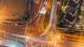 Aerial view of a road intersection between skyscrapers between skyscrapers night timelapse. Royalty Free Stock Photo