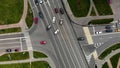 Aerial view of road junction or road intersection in city with cars turning left and righ Royalty Free Stock Photo