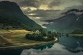Aerial view of road in landscape of fjord at Briksdalsbreen glacier in Jostedalsbreen mountains during summer morning Royalty Free Stock Photo