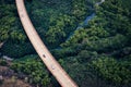 Aerial view of the road in lush green forest, Kauai, Hawaii Royalty Free Stock Photo