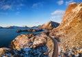 Aerial view at the road in mountains. Mountains and ocean shore during sunset in the Norway. Royalty Free Stock Photo