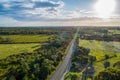 Road passing through agricultural land. Royalty Free Stock Photo