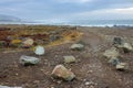 Aerial view of road with stones on Atlantic coast. Stones and rocks with moss on road along the ocean. Seacoast with morning dusk. Royalty Free Stock Photo